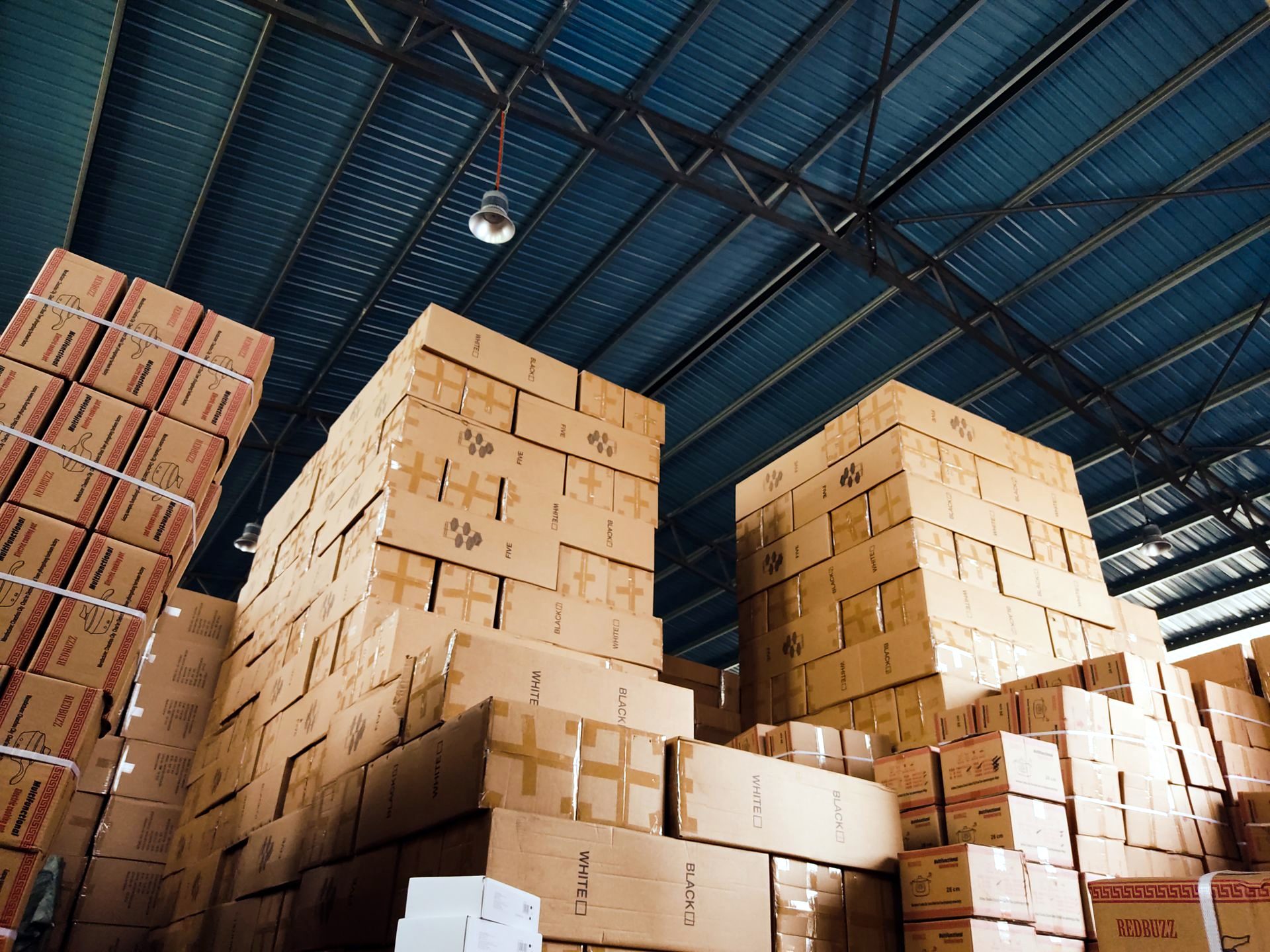 Corrugated cartons stacked in a packaging warehouse
